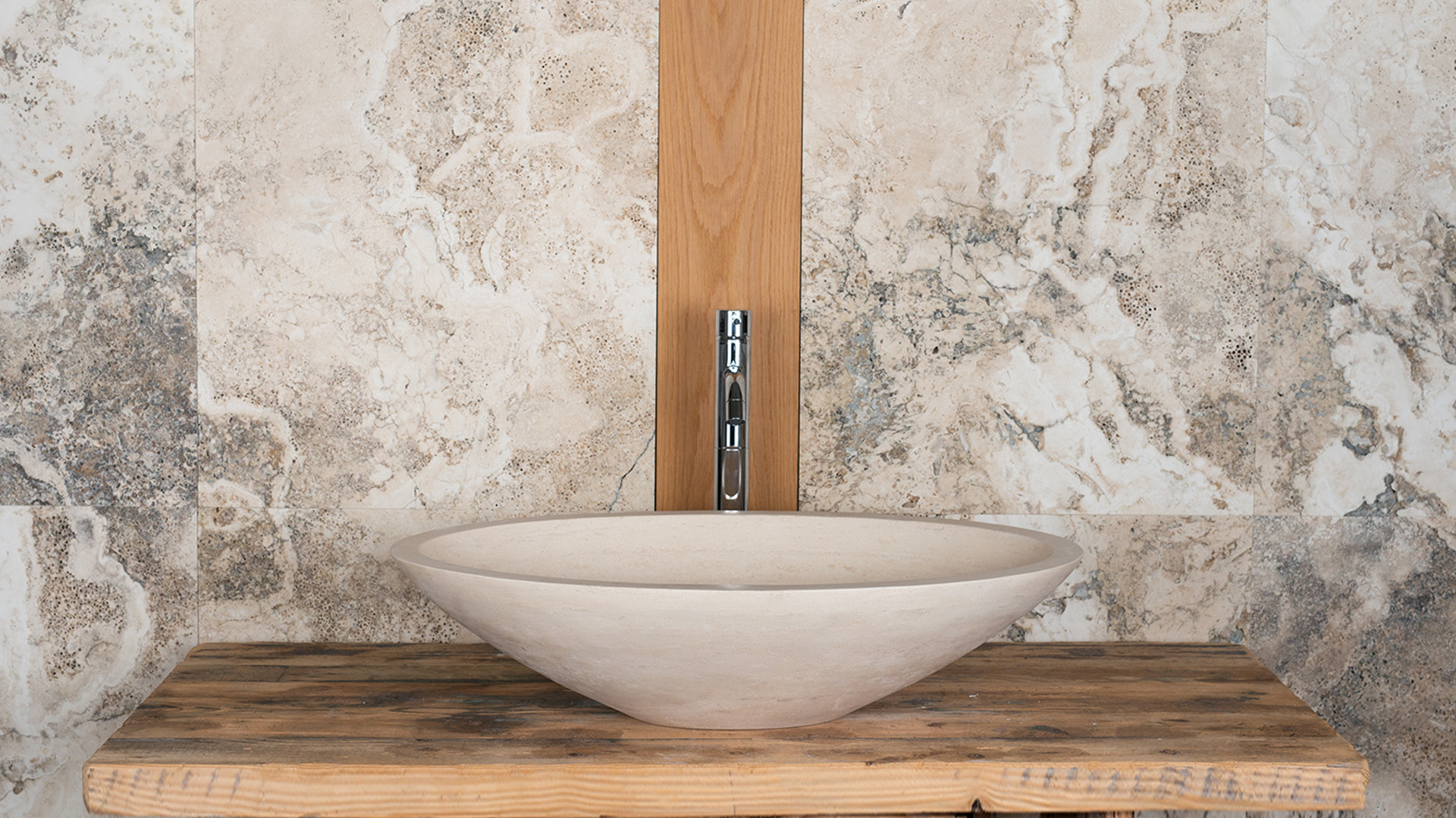 Oval travertine washbasin “Ovetto CH”