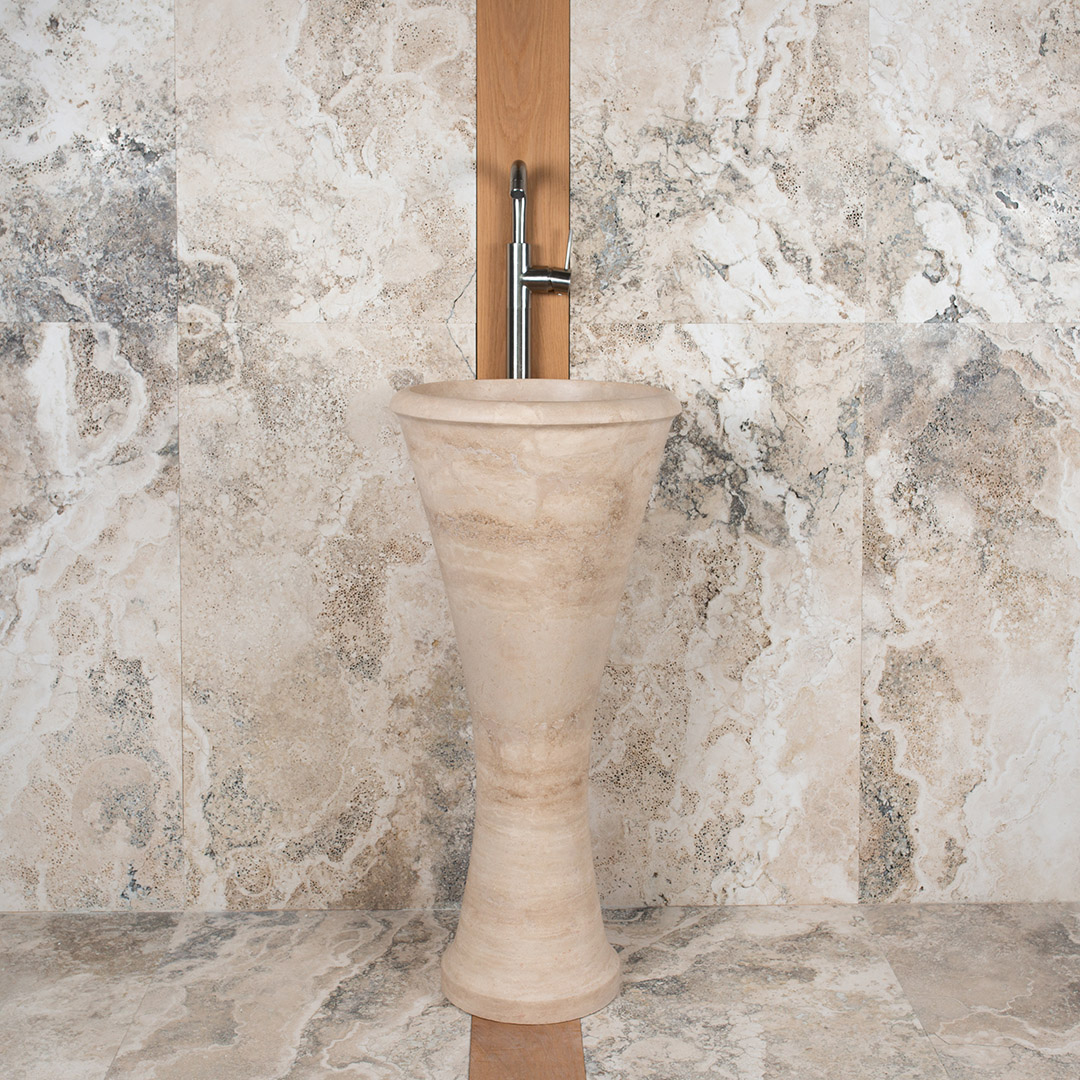 Freestanding travertine washbasin “Calice”