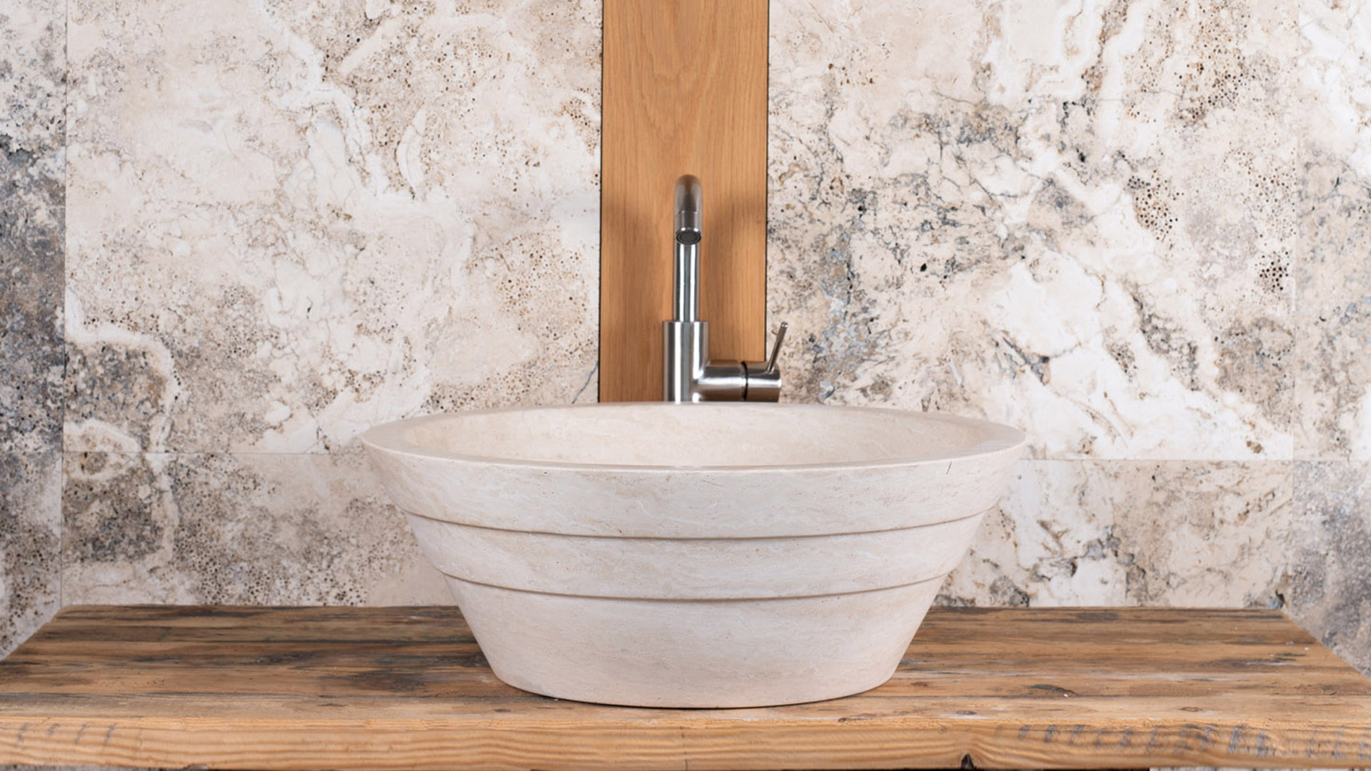 Round travertine washbasin “Castellina”
