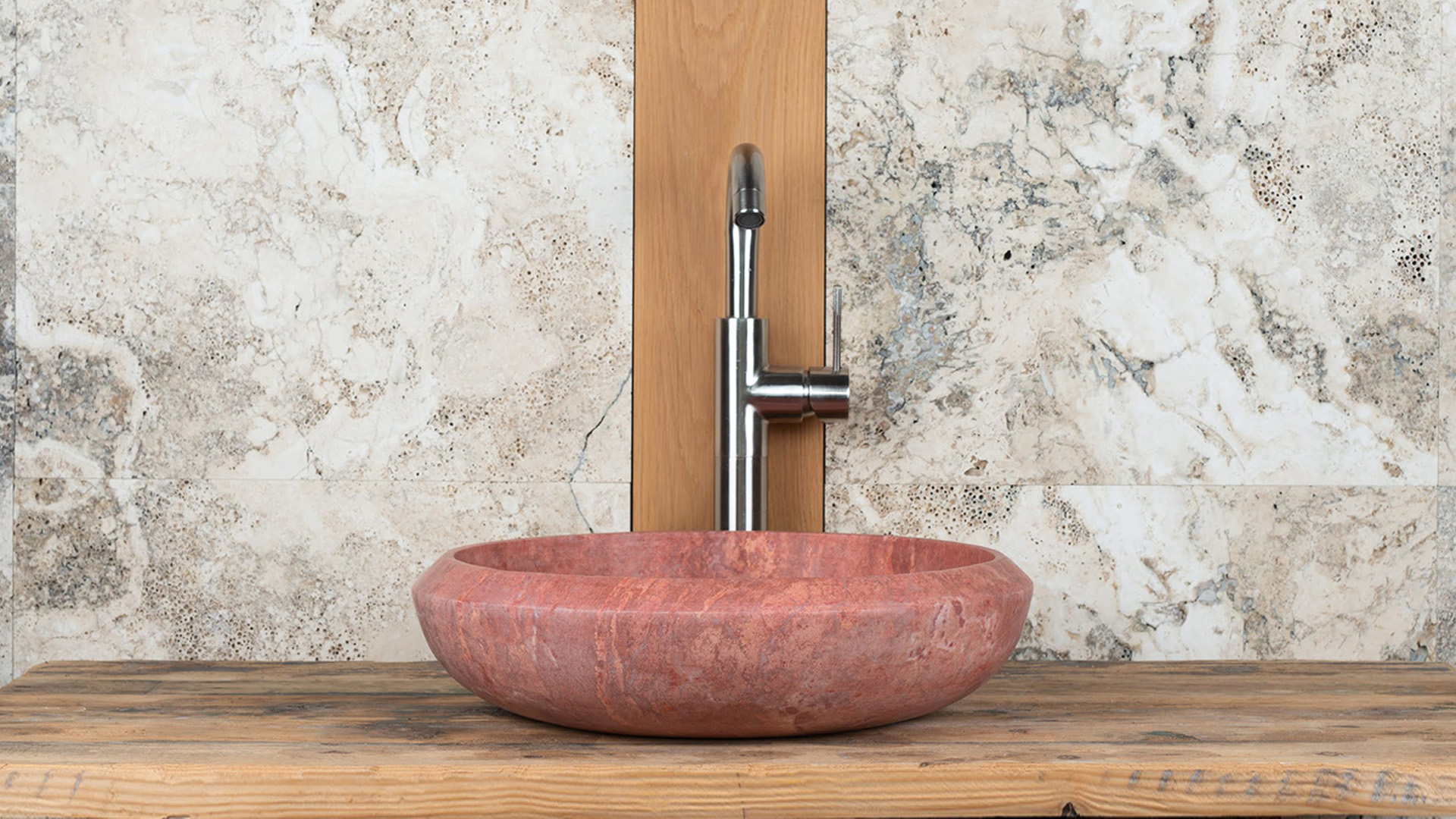 Small travertine washbasin “Essential V”